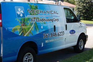 Mechanical Air Conditioning Corp service van parked outside a home for central AC installation.